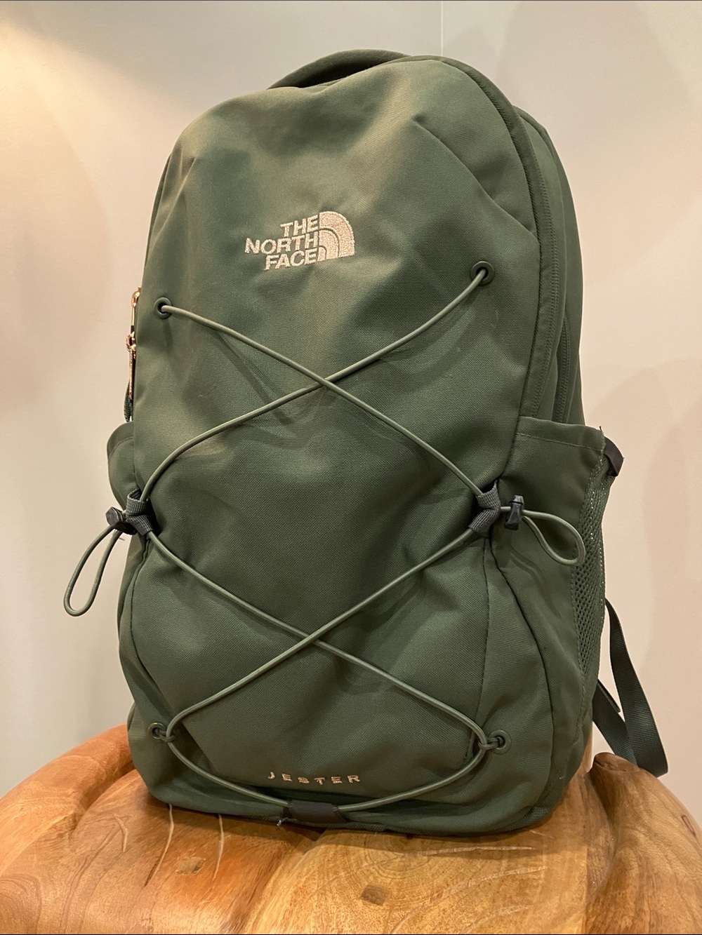 The North Face Jester Backpack in Green with Rose Gold